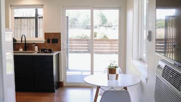 Superior Studio Suite, 1 Queen Bed, Kitchen, Mountain View | Living area | TV, DVD player, pay movies