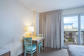 Partial Ocean View Room, 2 Queen Beds | Living area | 39-inch flat-screen TV with cable channels, TV