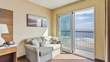 Habitación, 1 cama King size, hidromasaje, vista al océano | Área de sala de estar | Televisión de pantalla plana de 39 pulgadas con canales por cable