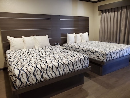 Room, 2 Queen Beds | Desk, blackout drapes, iron/ironing board, free WiFi