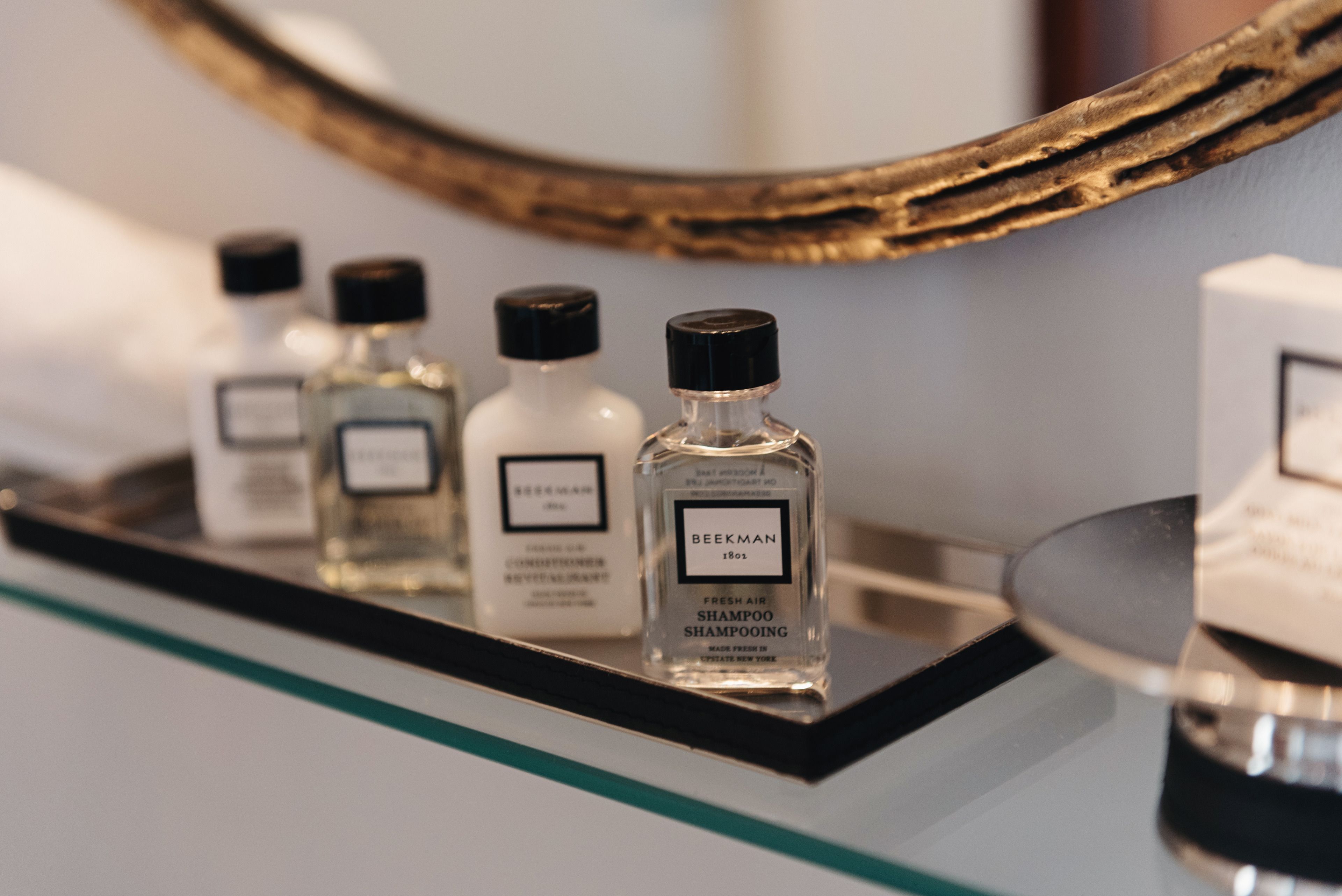 designer toiletries, hair dryer, bathrobes, towels