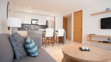 Premier Suite, 1 King Bed | Living area | Plasma TV