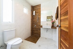 Superior Studio | Bathroom | Shower, free toiletries, hair dryer, slippers