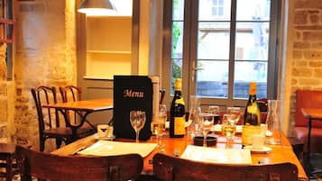 Breakfast, lunch, dinner served; local cuisine, alfresco dining