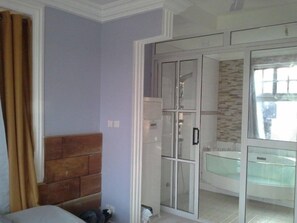 Apartment, 1 Bedroom | Bathroom | Shower, hair dryer, towels