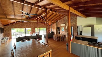 Group Lodge (4 Queen, 2 Single and 5 Bunk Bed), 4 Bedrooms, Pool View | Living area