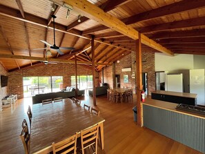 Group Lodge (4 Queen, 2 Single and 5 Bunk Bed), 4 Bedrooms, Pool View | Living area | LED TV, DVD player - Prom Coast Holiday Lodge (Fish Creek)