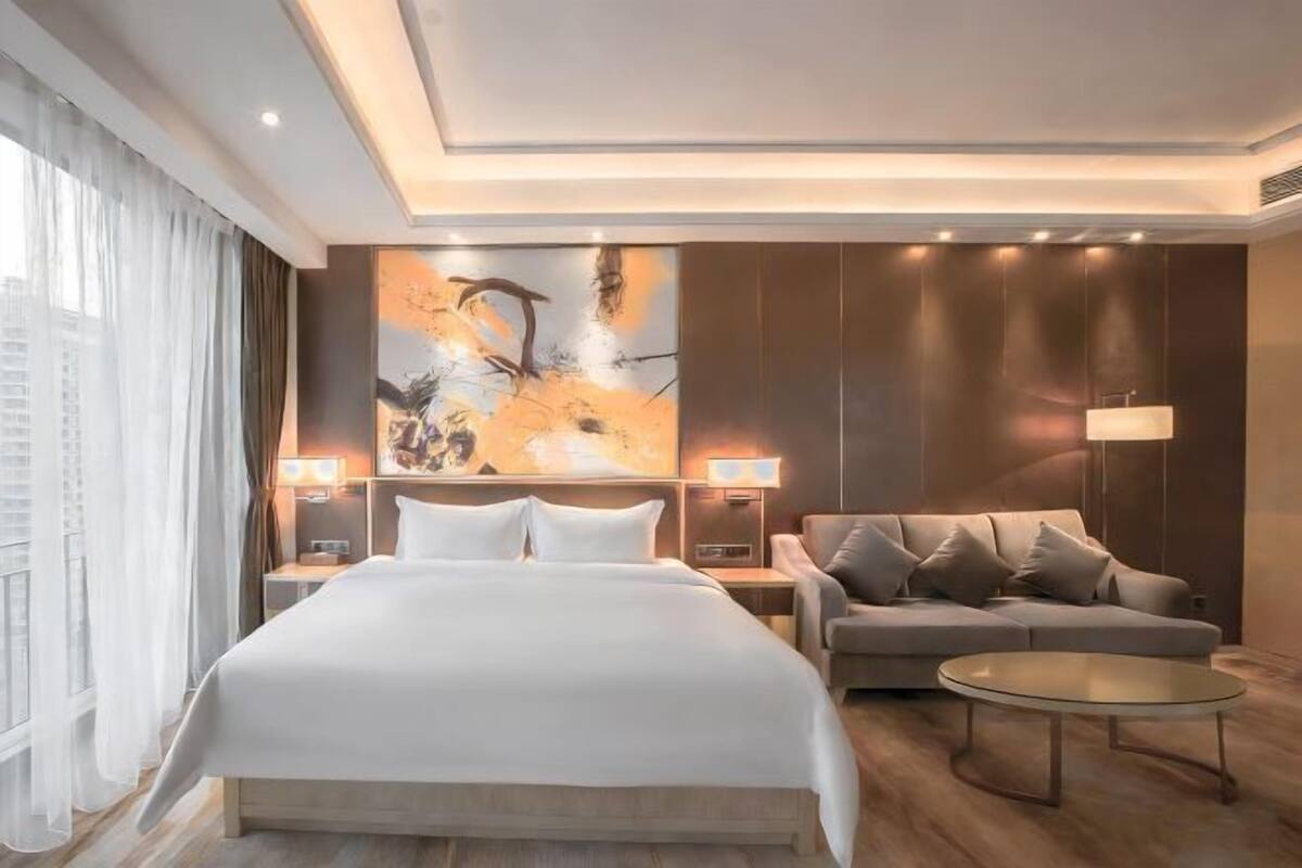 Roupas de cama premium, cortinas blackout, Wi-Fi de cortesia