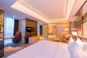 Habitación ejecutiva | Ropa de cama de alta calidad, cortinas blackout y wifi gratis