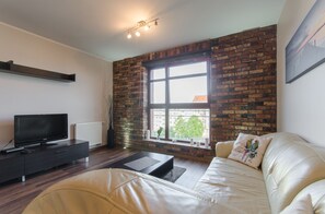 Apartment, 1 Bedroom, Kitchenette (4 people) | Living area | 32-inch flat-screen TV with cable channels, TV - Dom & House - Apartments Kamienice Nad Motlawa (Gdansk)