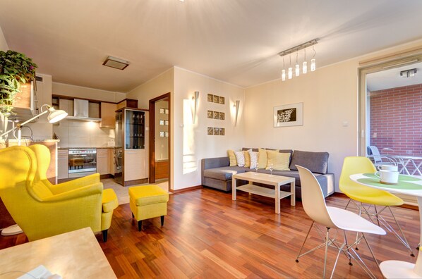 Comfort Apartment, 1 Bedroom, Balcony (Lastadia 35 street) | Living room | 32-inch flat-screen TV with cable channels, TV - Dom & House - Apartments Kamienice Nad Motlawa (Gdansk)