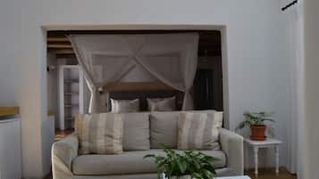 Family Bed and Breakfast en-suite | Living room | 0-inch LED TV with satellite channels, TV, books
