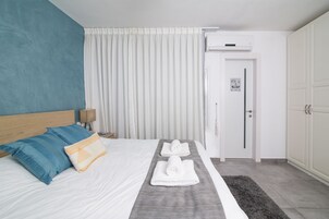 Deluxe Apartment, 1 Bedroom, Kitchen, Garden Area | 1 bedroom, in-room safe, desk, soundproofing