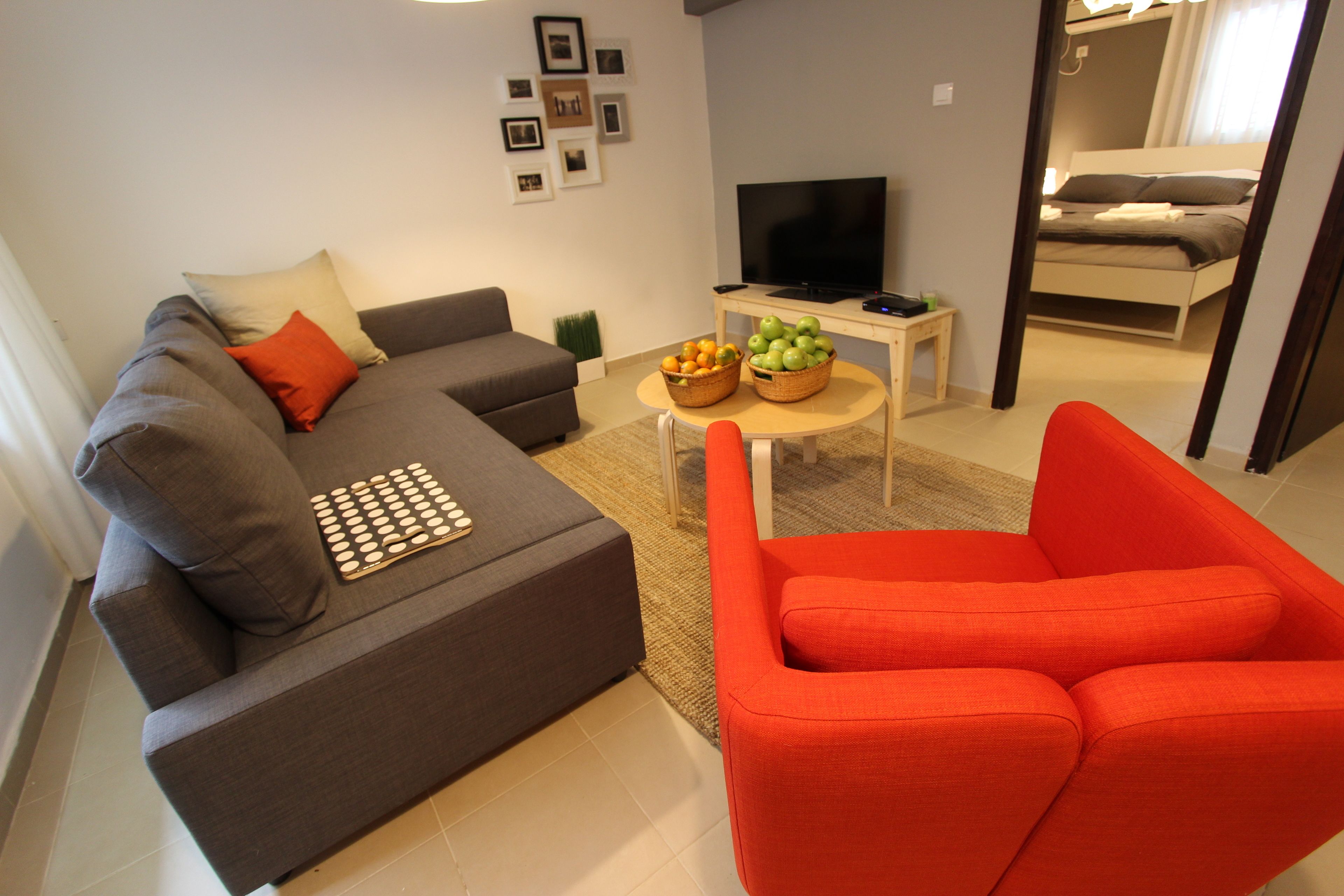 Familieleilighet, 2 soverom | Oppholdsområde | Flatskjerm-TV