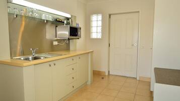Fridge, microwave, coffee/tea maker, electric kettle