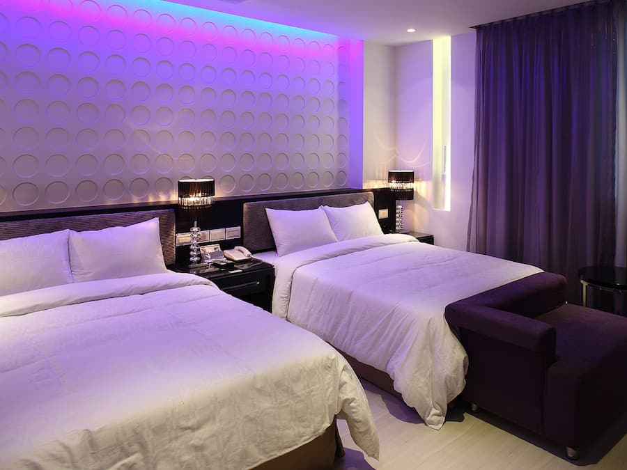 Elite Quadruple Room | Free minibar, individually decorated, desk, blackout drapes