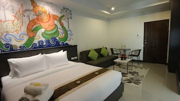 Junior Studio Suite, 1 King Bed, Garden View | In-room safe, desk, free WiFi