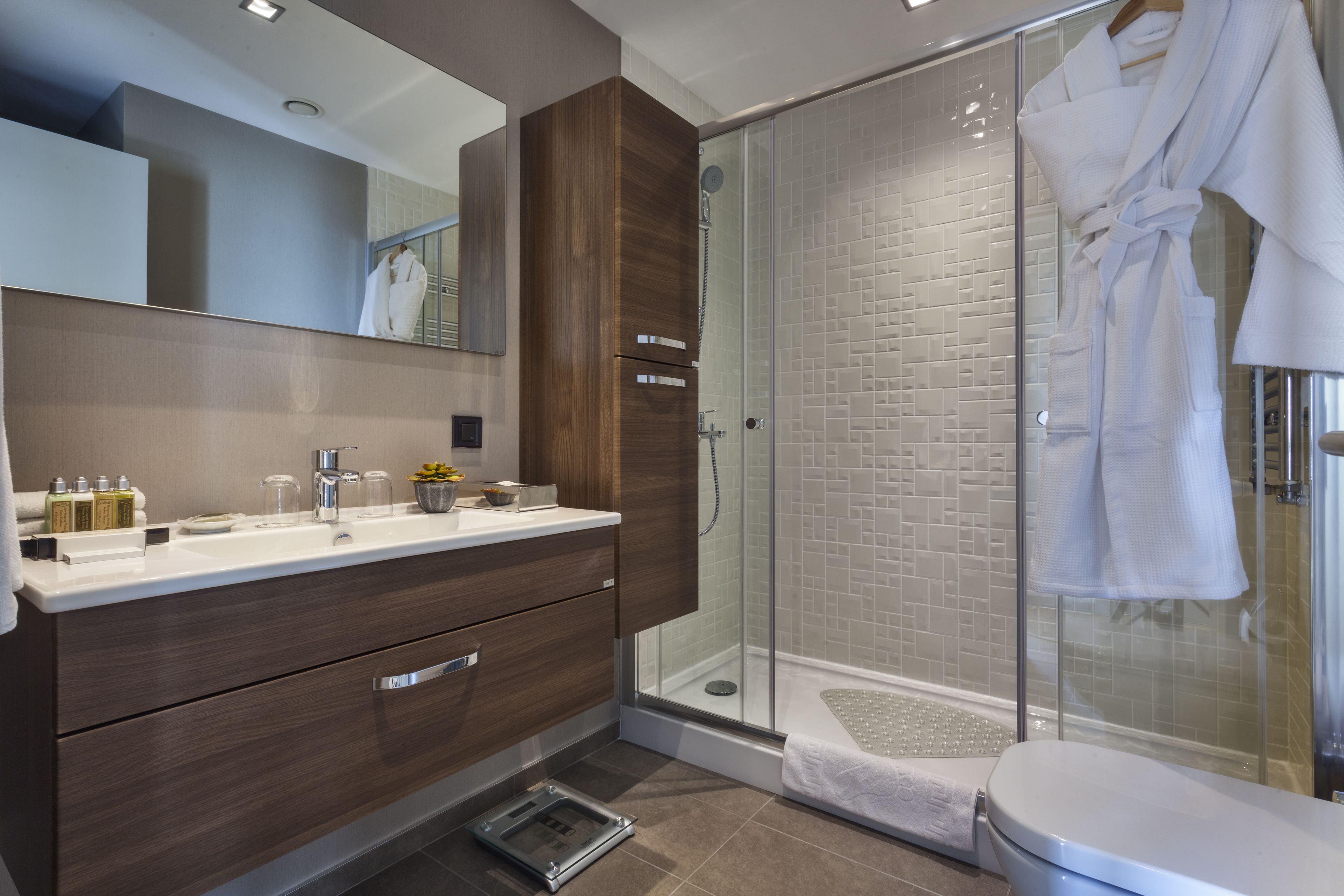 shower, designer toiletries, hair dryer, bathrobes