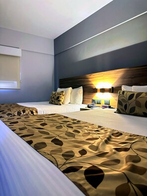 Standard Room, 2 Double Beds, Non Smoking | Desk, laptop workspace, blackout drapes, soundproofing - Sleep Inn Mazatlan (Mazatlán)