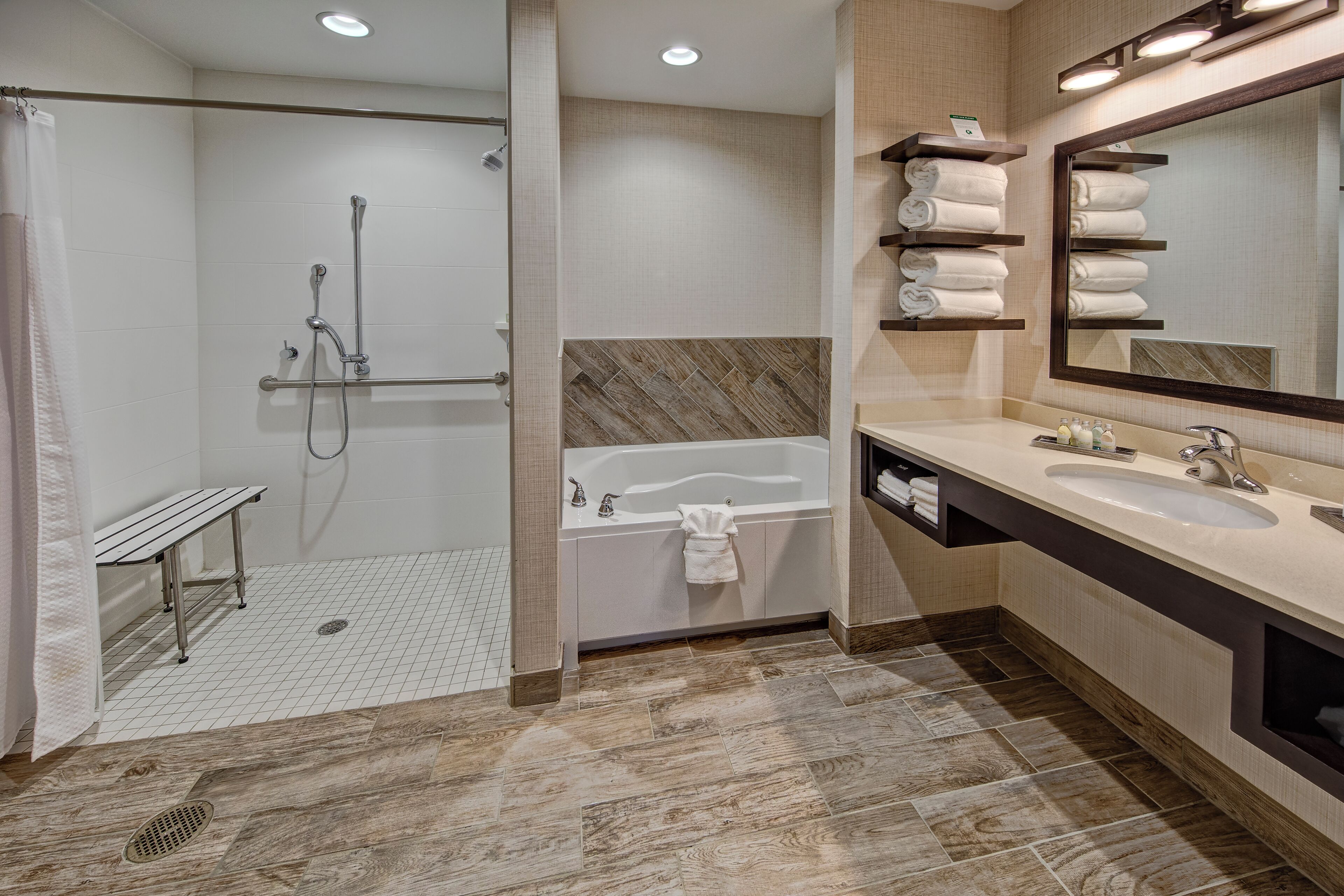 suite, 1 king bed with sofa bed (mobility accessible, tub) | bathroom | free toiletries, hair dryer, towels, soap