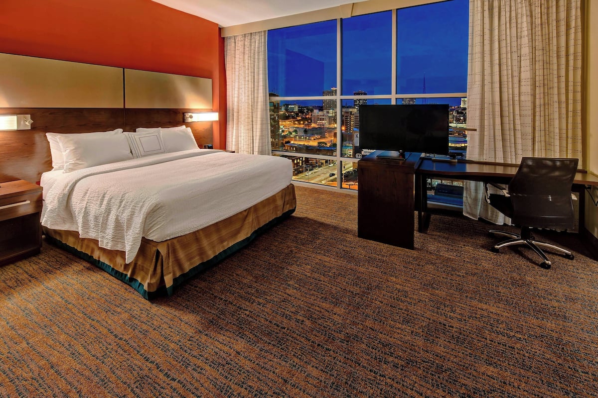 deluxe studio suite, 1 king bed with sofa bed | desk, laptop workspace, blackout curtains, iron/ironing board