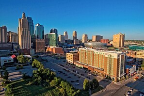 A cityscape with a prominent hotel featuring a large building with a flat roof and a sign that reads "Residence Inn." - Residence Inn by Marriott Kansas City Downtown/ Convention (Kansas City)