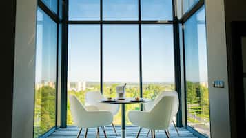Suite, 1 King Bed, Balcony, City View | Minibar, in-room safe, desk, laptop workspace