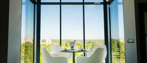 Suite, 1 King Bed, Balcony, City View | Minibar, in-room safe, desk, laptop workspace