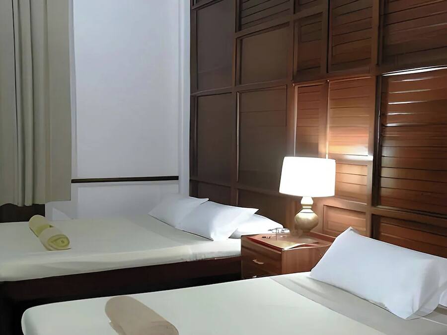 Egyptian cotton sheets, pillow-top beds, desk, blackout curtains