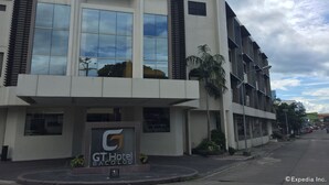 A modern hotel building with a prominent sign for GT Hotel Bacolod. - GT Hotel Bacolod (Bacolod)