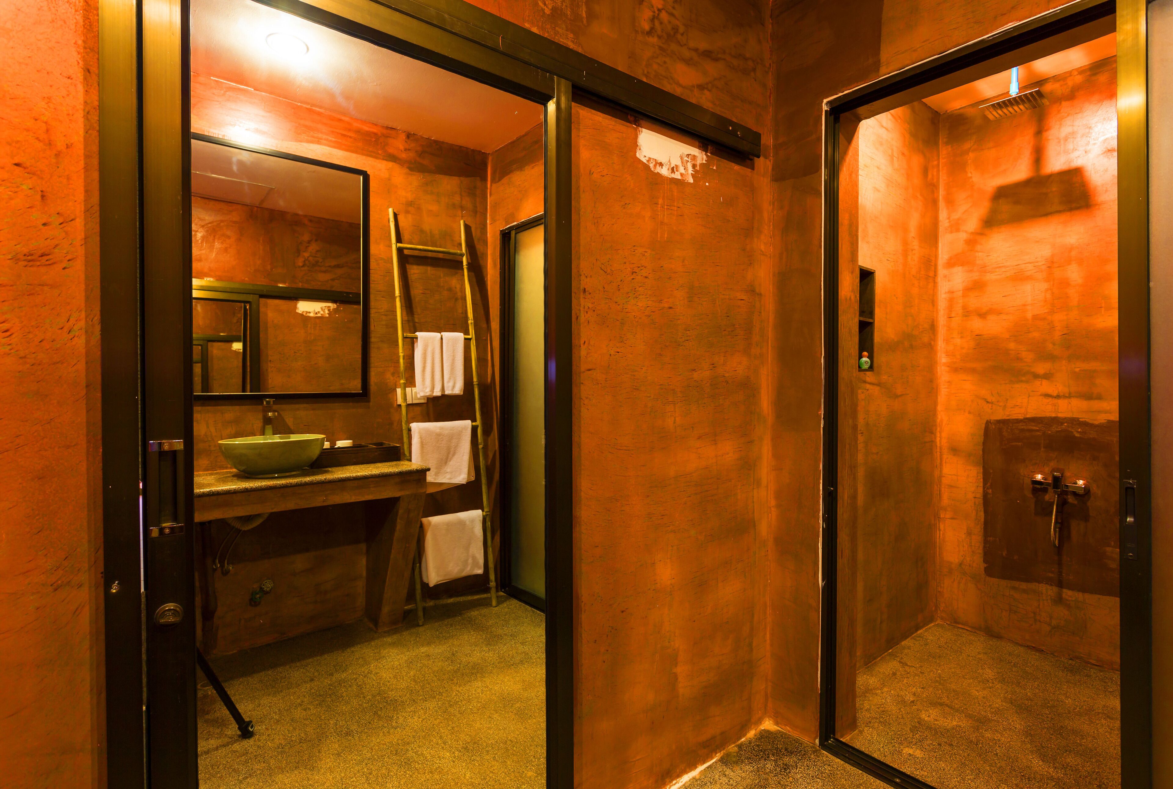 family room, pool view | bathroom | combined shower/bathtub, free toiletries, hair dryer, bathrobes