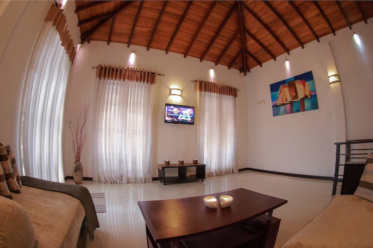 apartment (ac) | living area | flat-screen tv