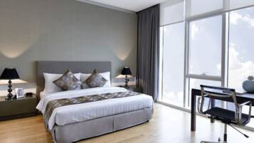 One Bedroom Grand Premier | In-room safe, desk, laptop workspace, blackout curtains