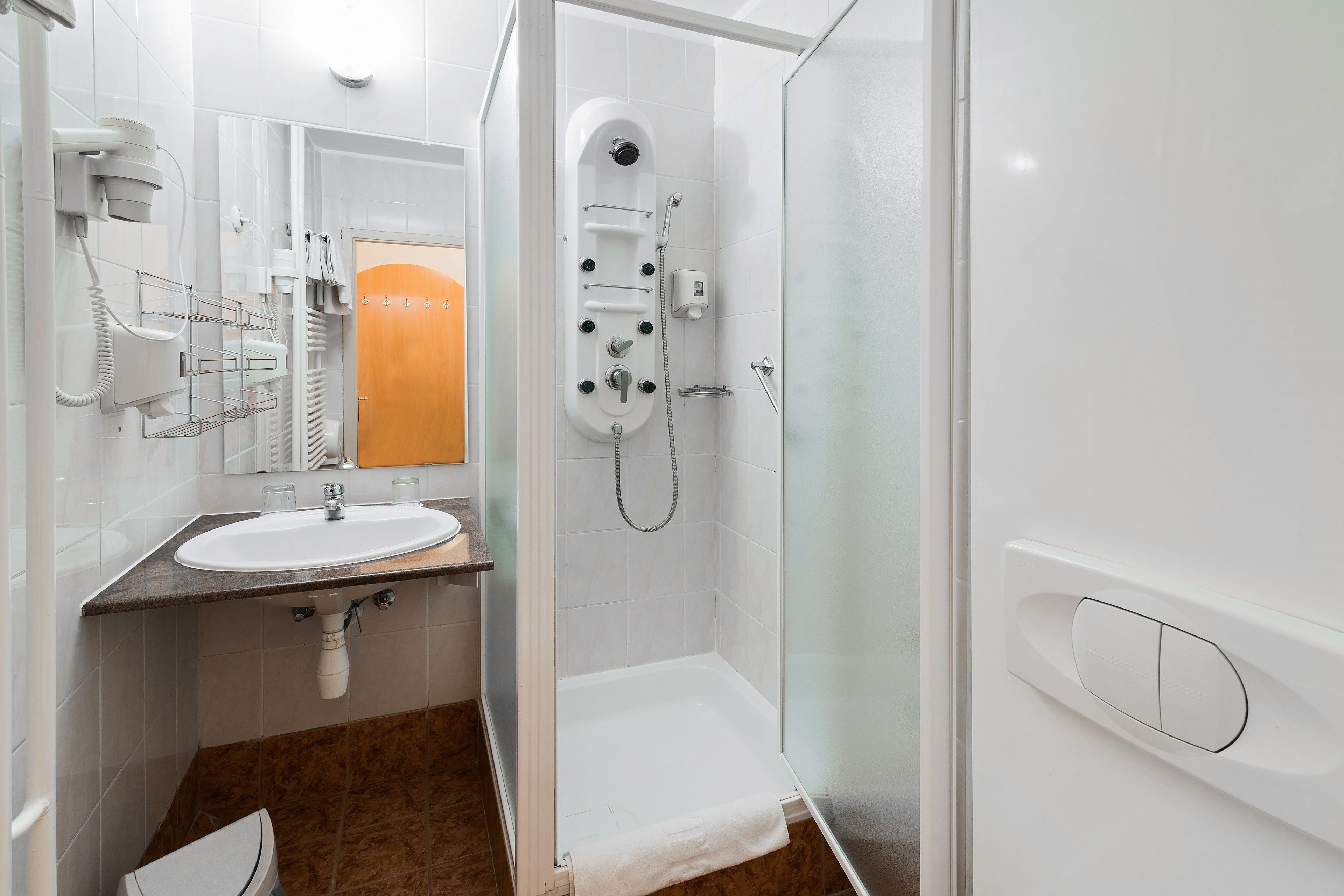 shower, hair dryer, bathrobes, towels