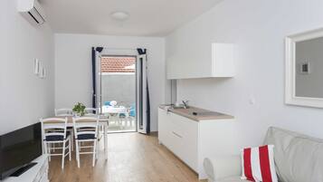 Appartement (Comfort One-Bedroom Apartment with Te) | Salle à manger