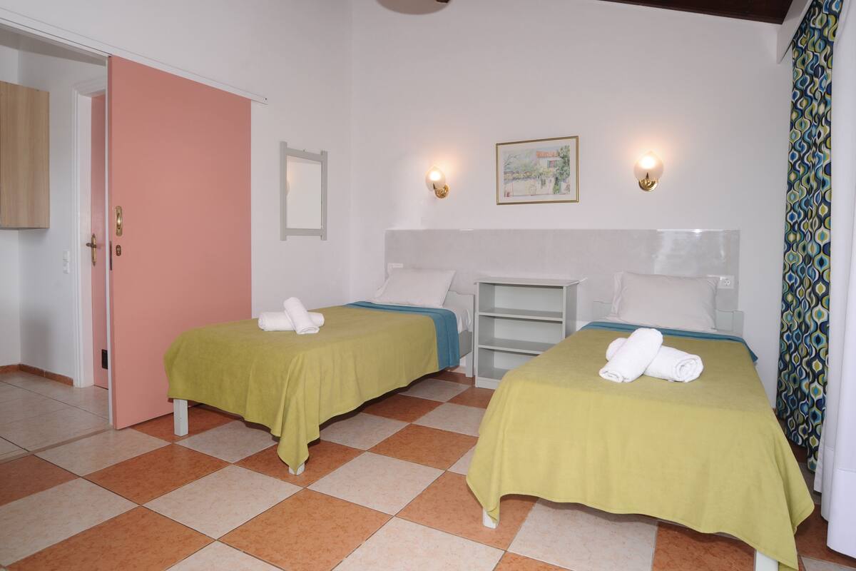 In-room safe, iron/ironing board, cribs (free), bed sheets