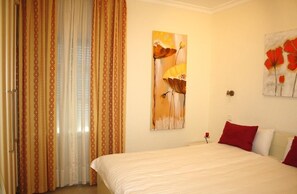 Bungalow, 1 slaapkamer | 1 slaapkamer, een kluis op de kamer, een strijkplank/strijkijzer