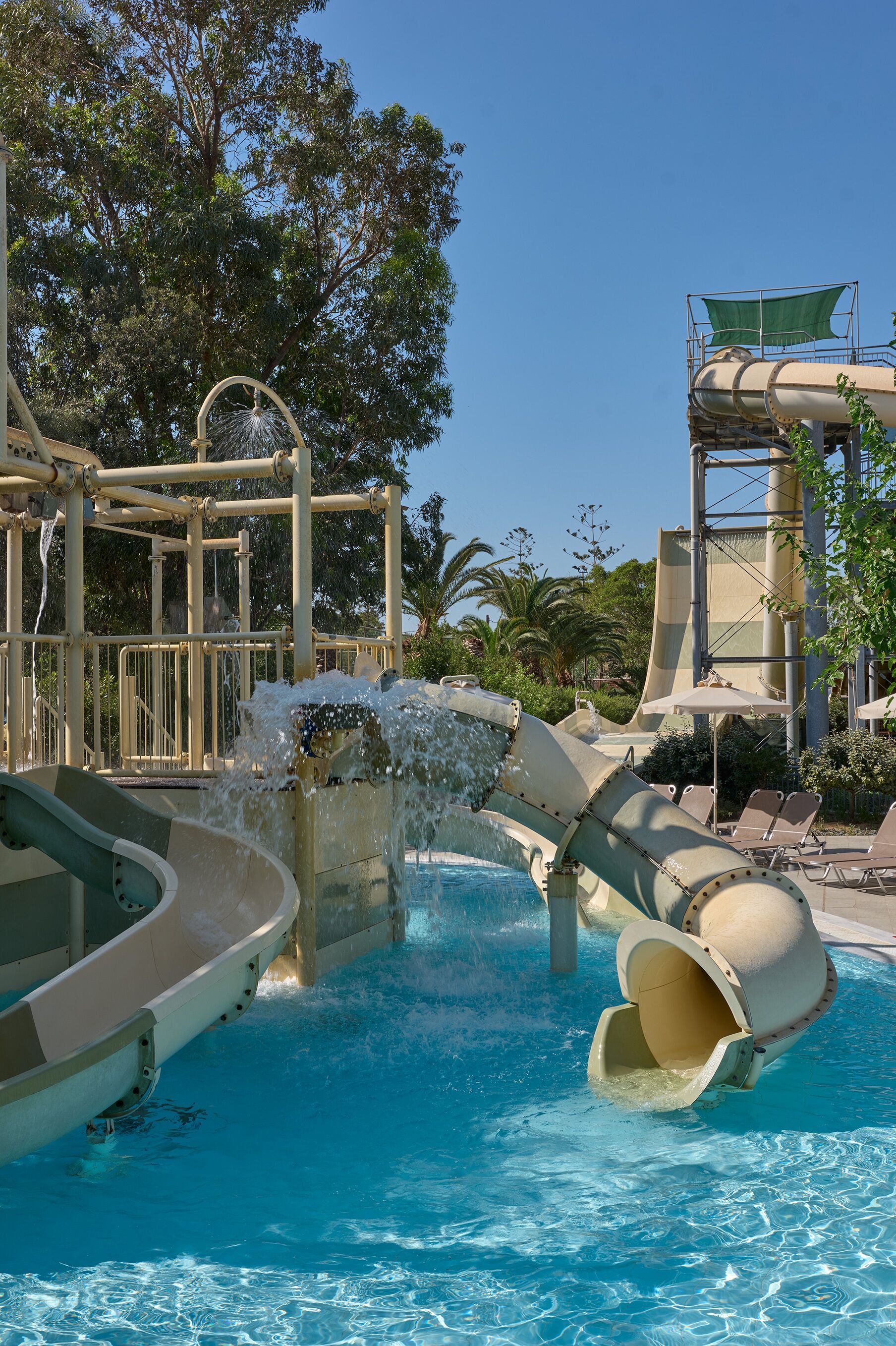 A water park with slides and a pool.