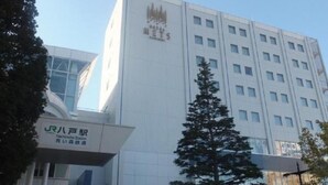 A multi-story building with a prominent sign at the top. - JR East Hotel Mets Hachinohe (Hachinohe)