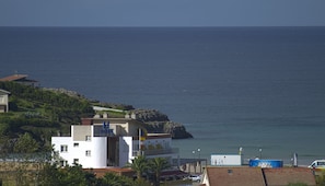 A coastal building with a visible sign reading "Costa de Ajo". - Hotel Costa de Ajo (Bareyo)