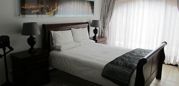 Premium bedding, in-room safe, individually decorated