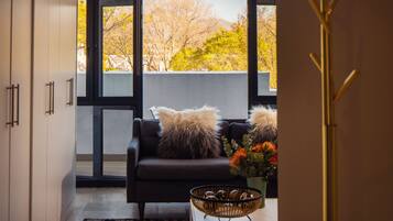 Room, 1 Bedroom | Living area | Flat-screen TV, fireplace