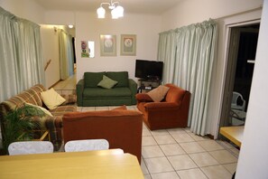 The Apartment | Living area | LED TV - Clinch Self Catering (Durban North)
