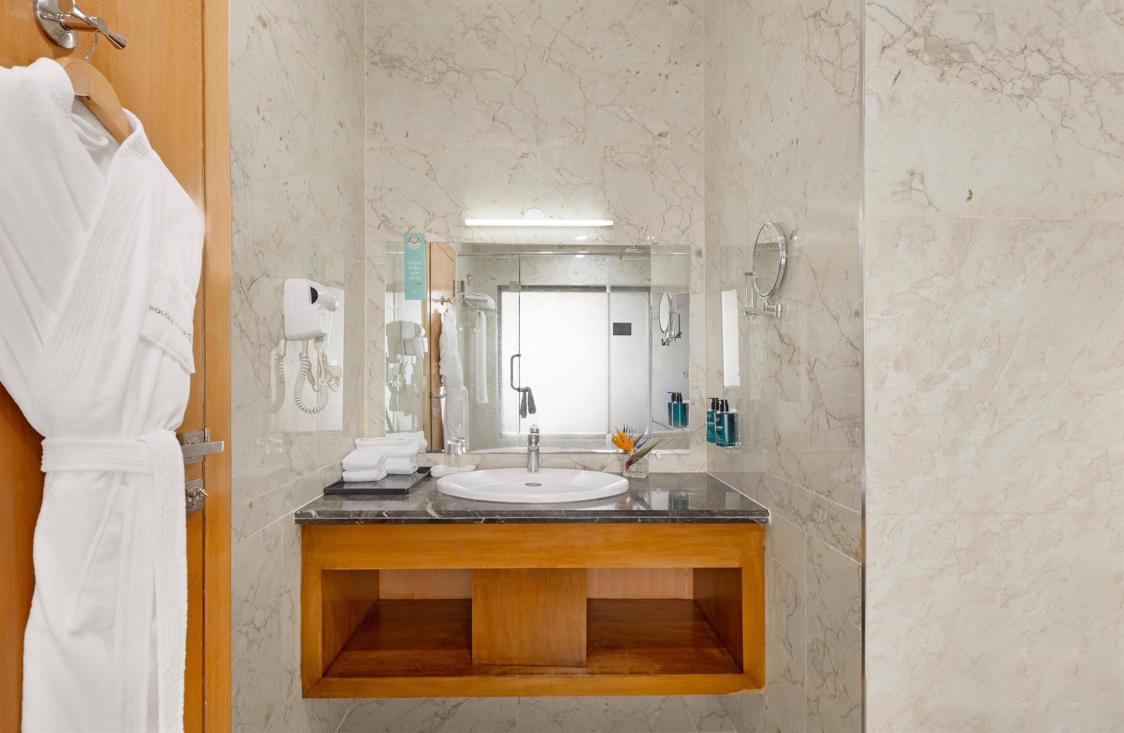 shower, rainfall showerhead, eco-friendly toiletries, hair dryer