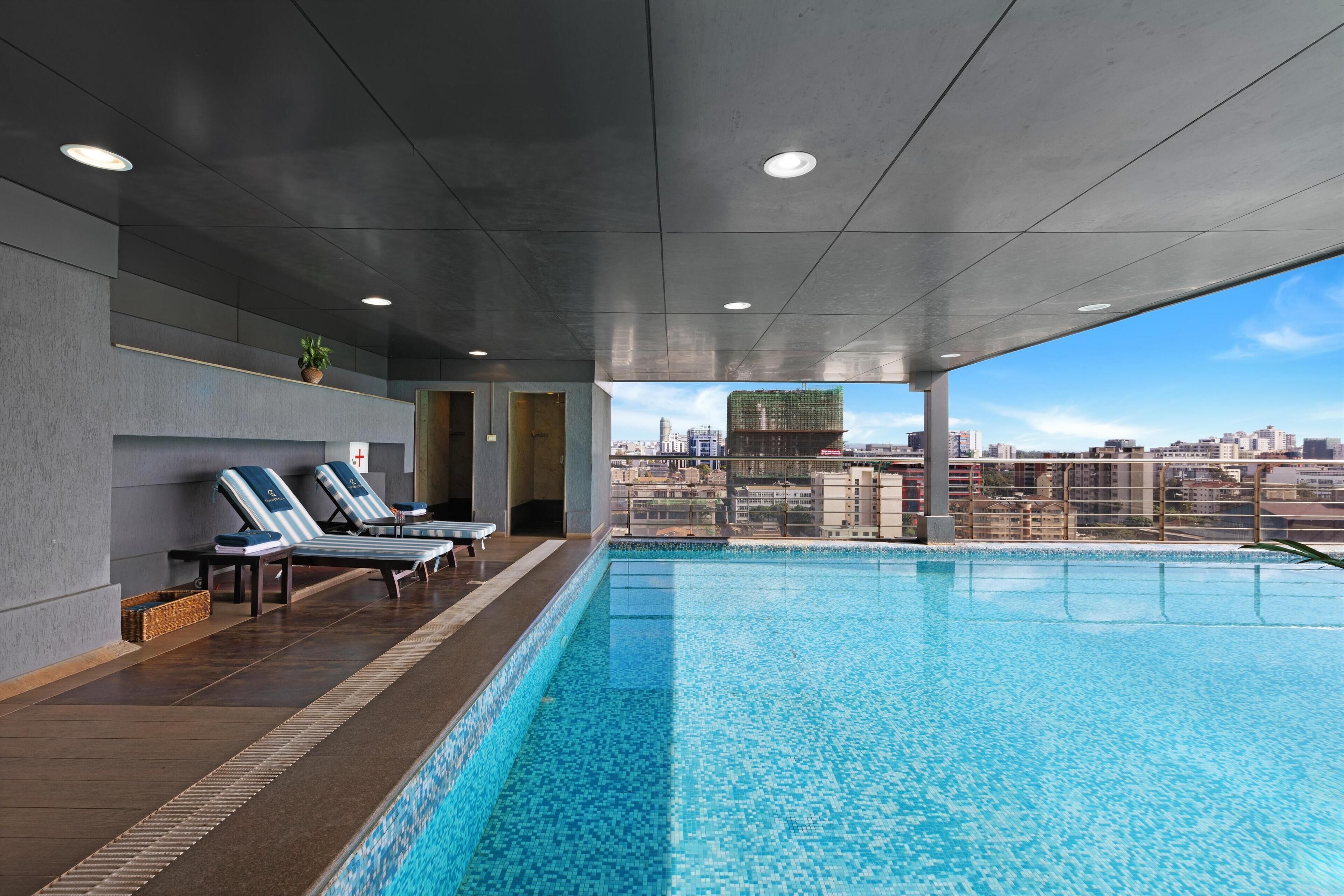 Outdoor pool, pool umbrellas, sun loungers