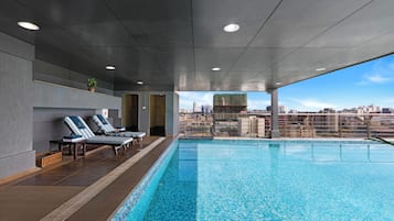 Outdoor pool, pool umbrellas, sun loungers