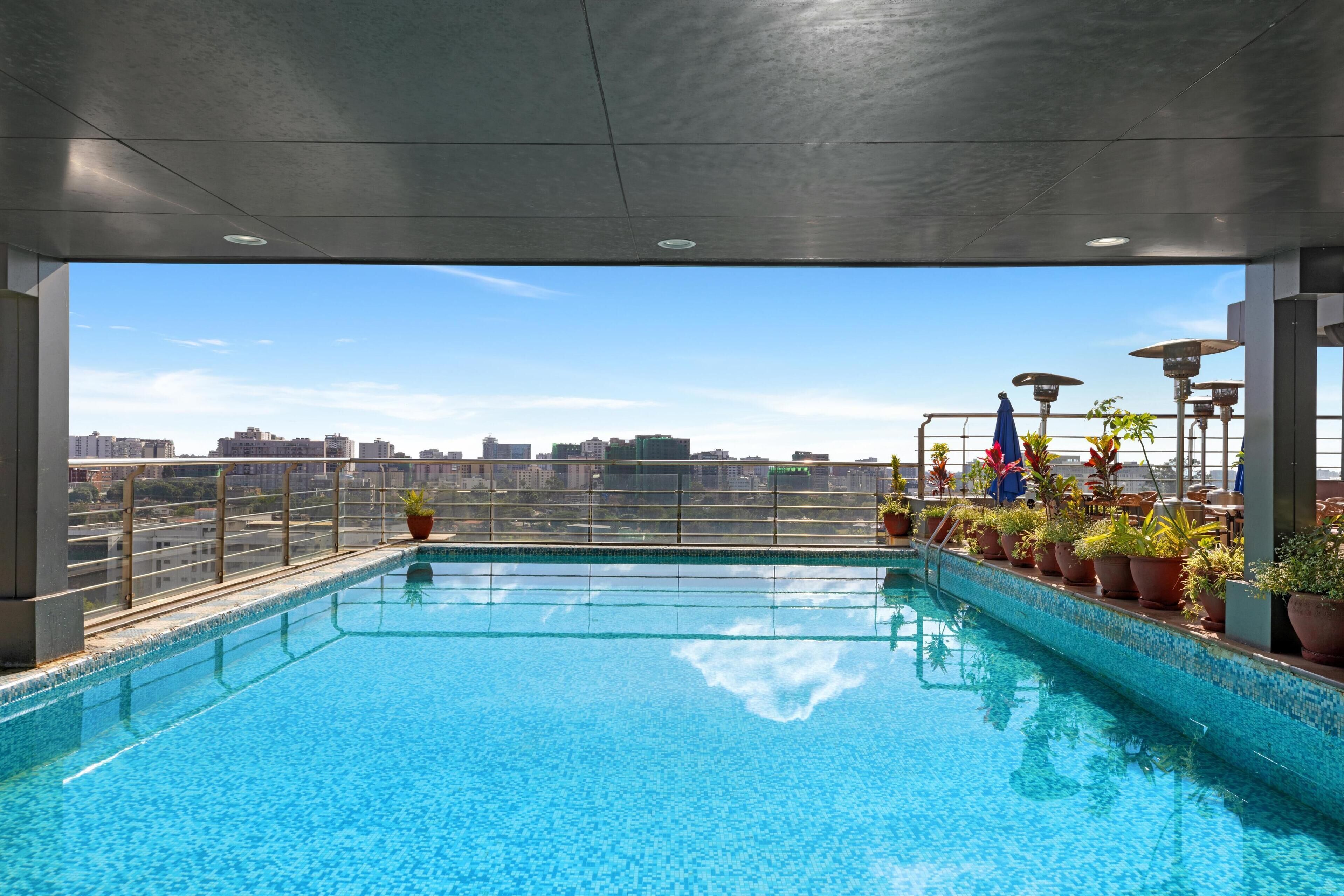 Outdoor pool, pool umbrellas, pool loungers