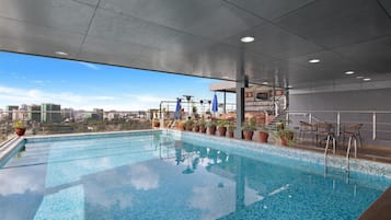 Outdoor pool, pool umbrellas, pool loungers