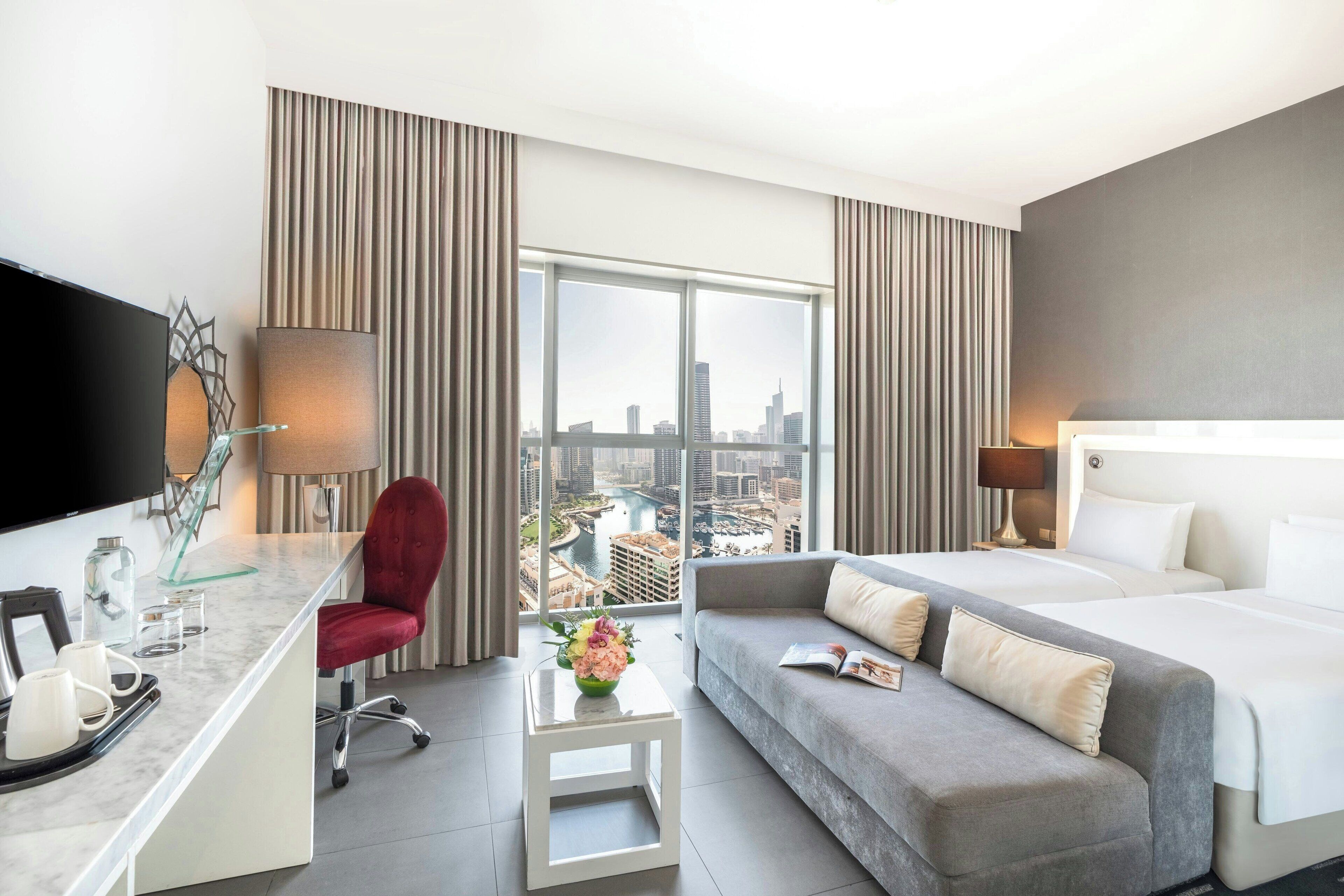 Deluxe kamer, 2 eenpersoonsbedden | Luxe beddengoed, een minibar, een kluis op de kamer