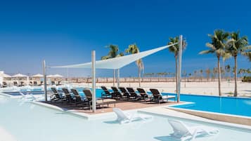 3 outdoor pools, pool umbrellas, pool loungers